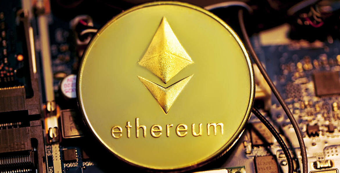 An Ethereum coin placed on a computer mainboard