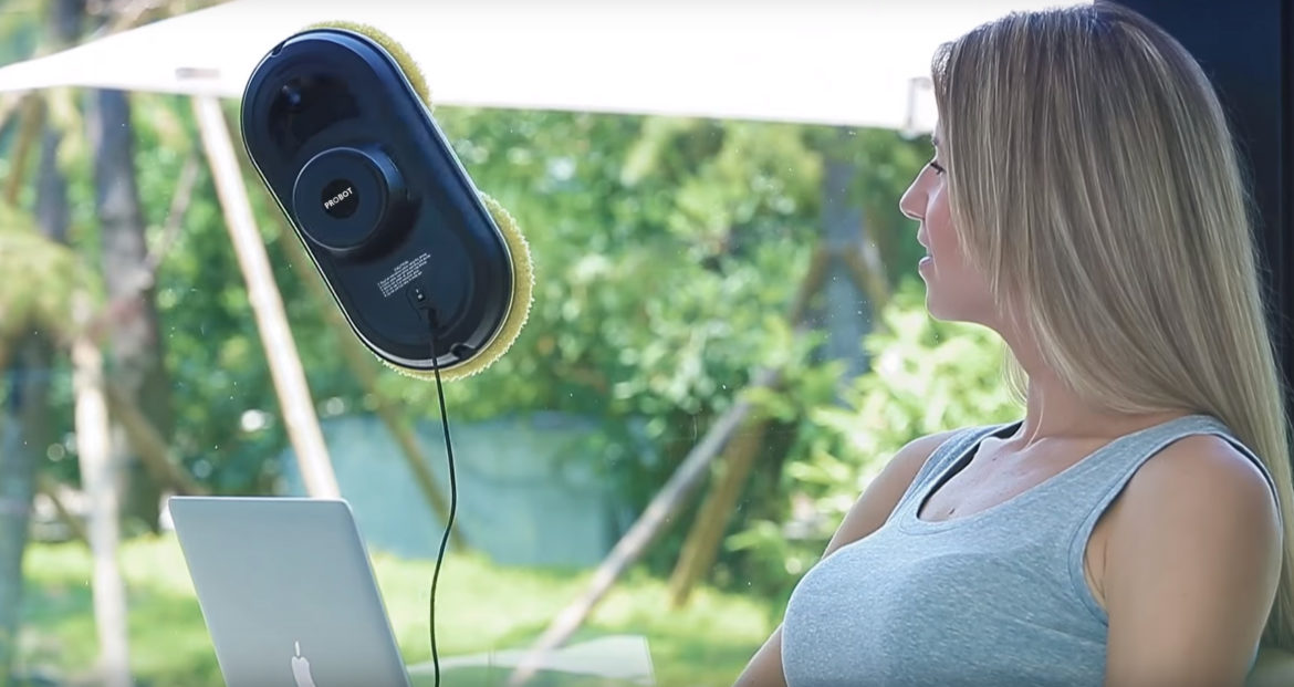 window cleaning robot and woman