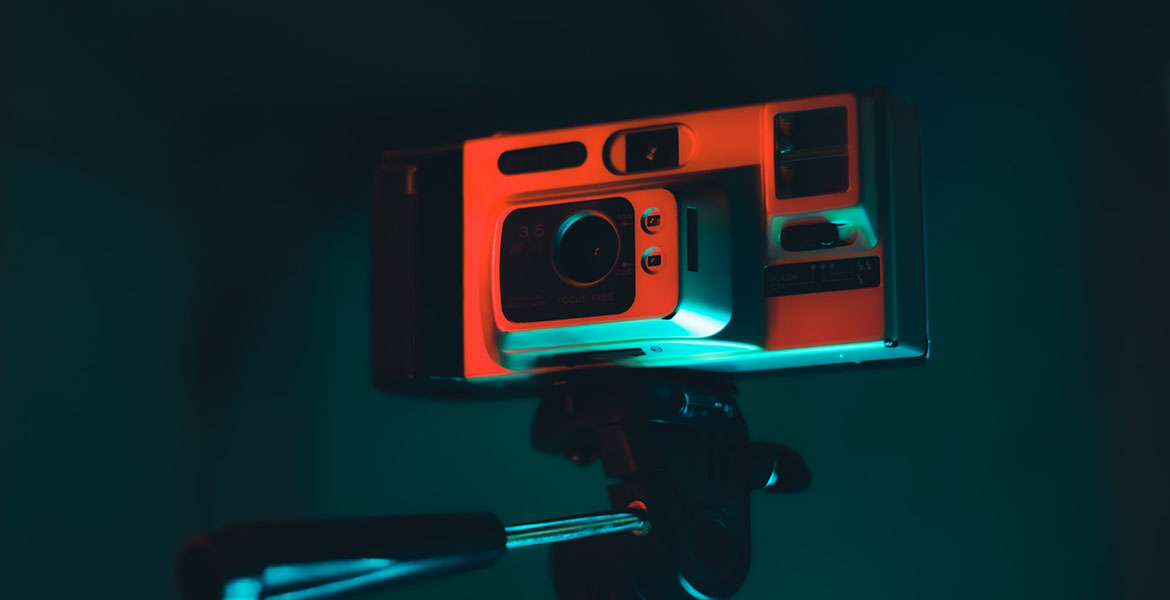 A vintage lens in orange lighting