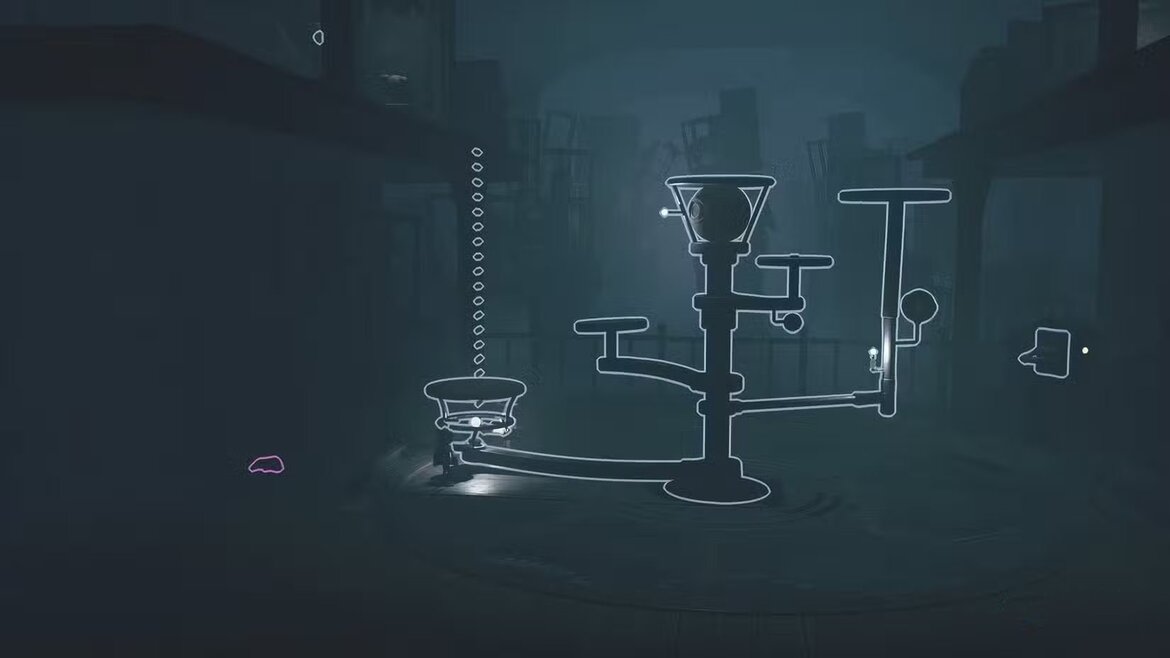 Алон толкает большой механизм в Little Nightmares