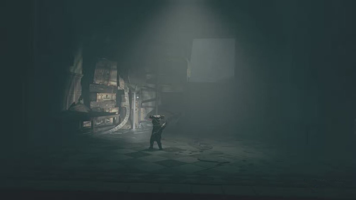 Алон светит фонариком на скамейку в Little Nightmares