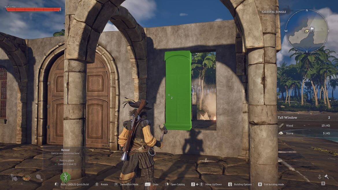 Player character in armor stands before a bright green doorway placed in a ruined stone wall on screen UI shows building options and a map in the corner