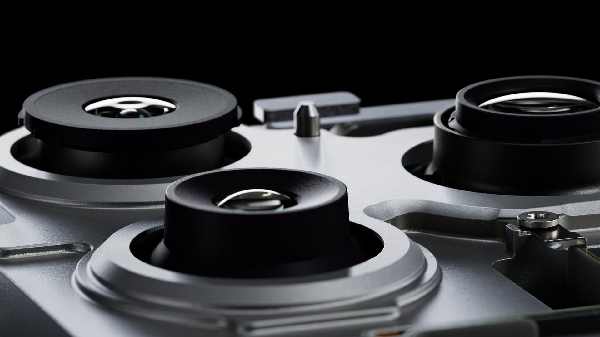 Close up of a hard drives internal components shiny circular platters and readwrite areas visible in black housings