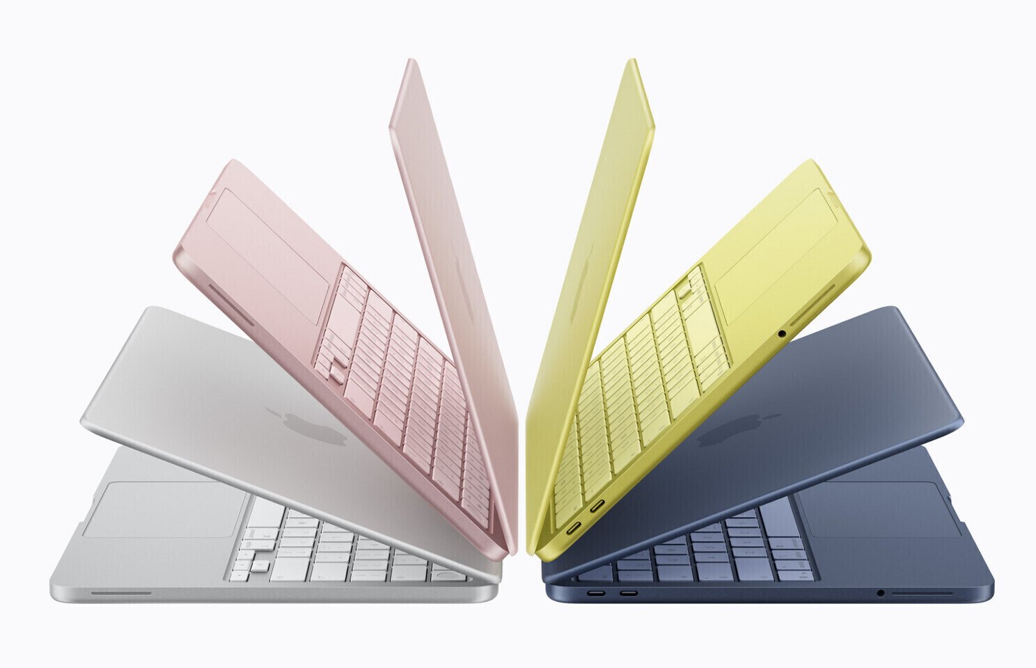 Five pastel colored laptops arranged in a circular fan showing different angles and orientations