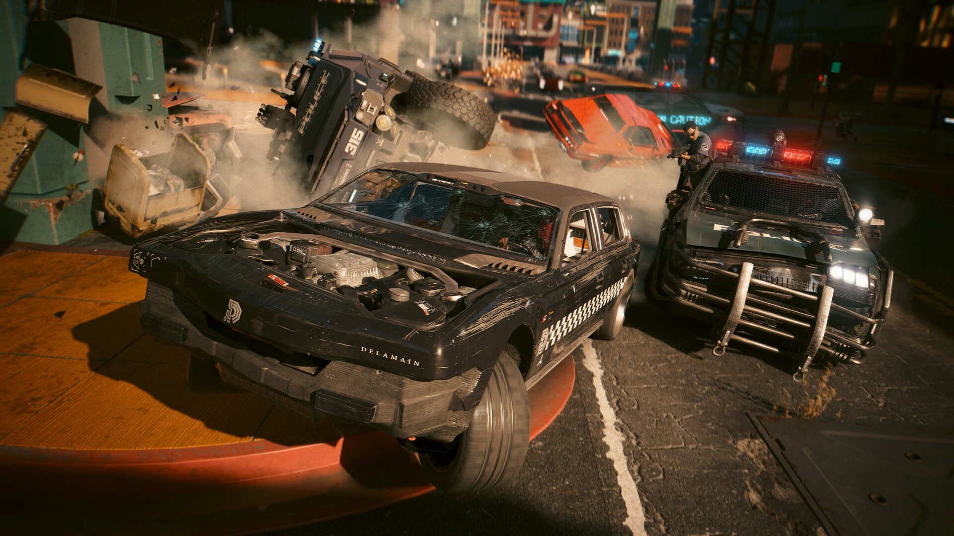 Crashing city scene with a damaged police pickup exposed engine and an armored police vehicle beside an overturned red car in the background as debris flies about