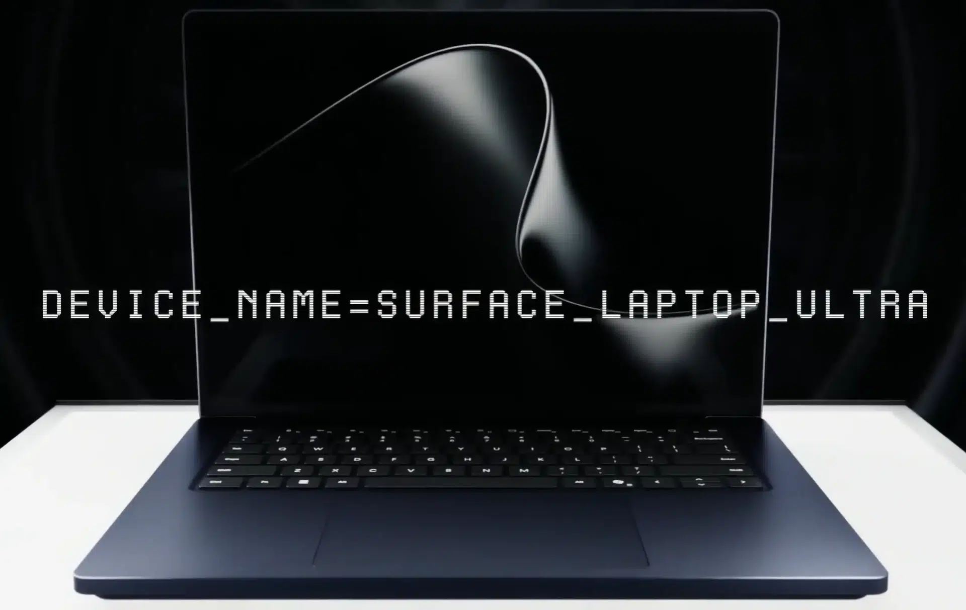 Laptop with a black screen displaying DEVICE NAME=SURFACE LAPTOP ULTRA in white digital font on a dark background