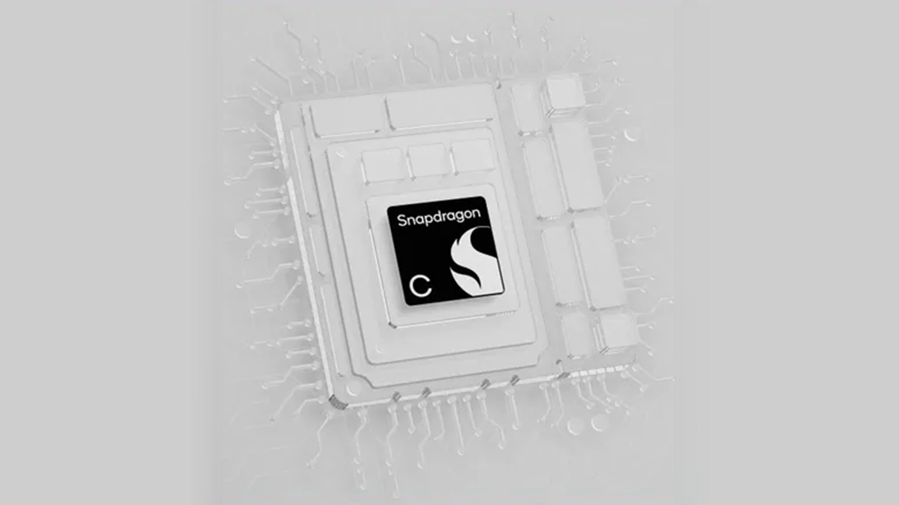 Close up of a Qualcomm Snapdragon processor chip on a circuit board with the Snapdragon logo visible at the center