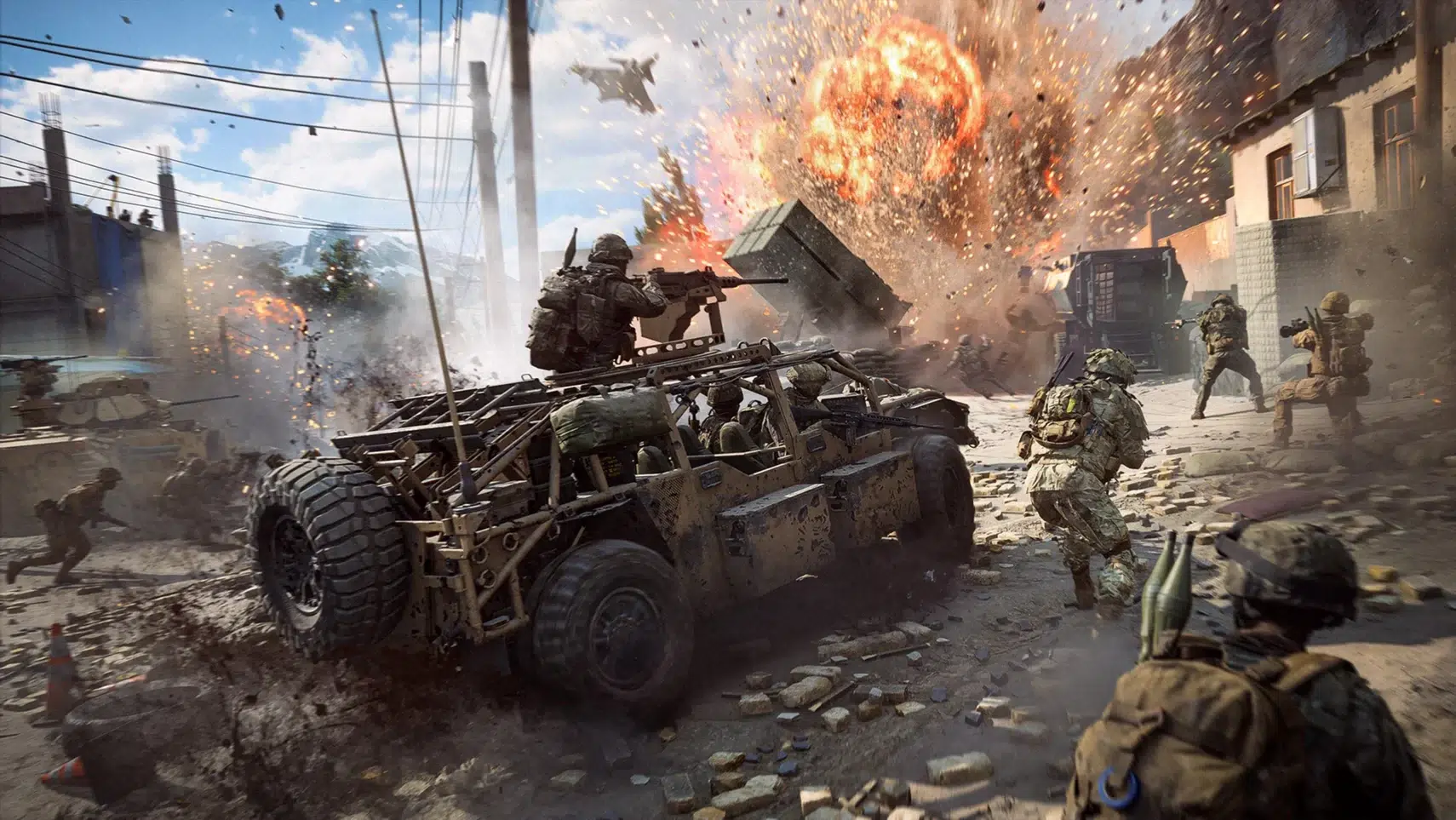Soldiers fire from a damaged armored vehicle as a massive explosion erupts in a war torn street with smoke and debris