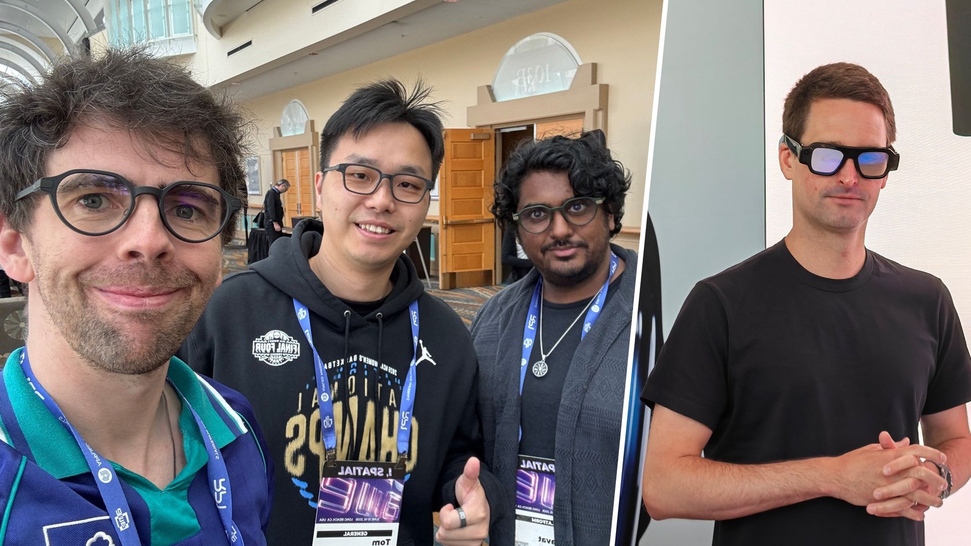 Group selfie of three men at a conference wearing lanyards and badges smiling at the camera in a bright indoor venue with arched windows in the background and a separate man posing on the right side in front of a panel screen