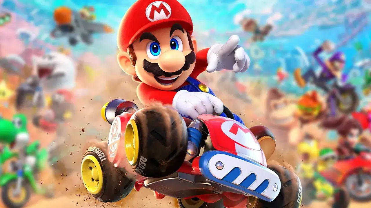 Mario in a red kart jumping at high speed against a blur of other racers in the background