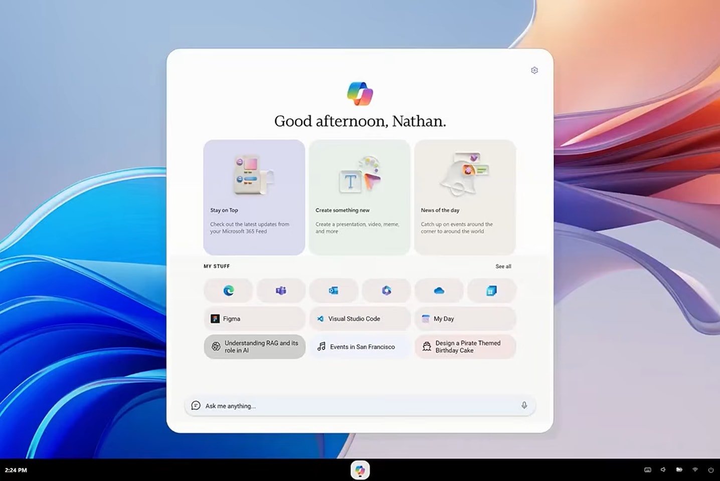 Desktop dashboard with a white rounded widget showing Good afternoon Nathan and three colorful tiles set on a blue pink abstract wallpaper