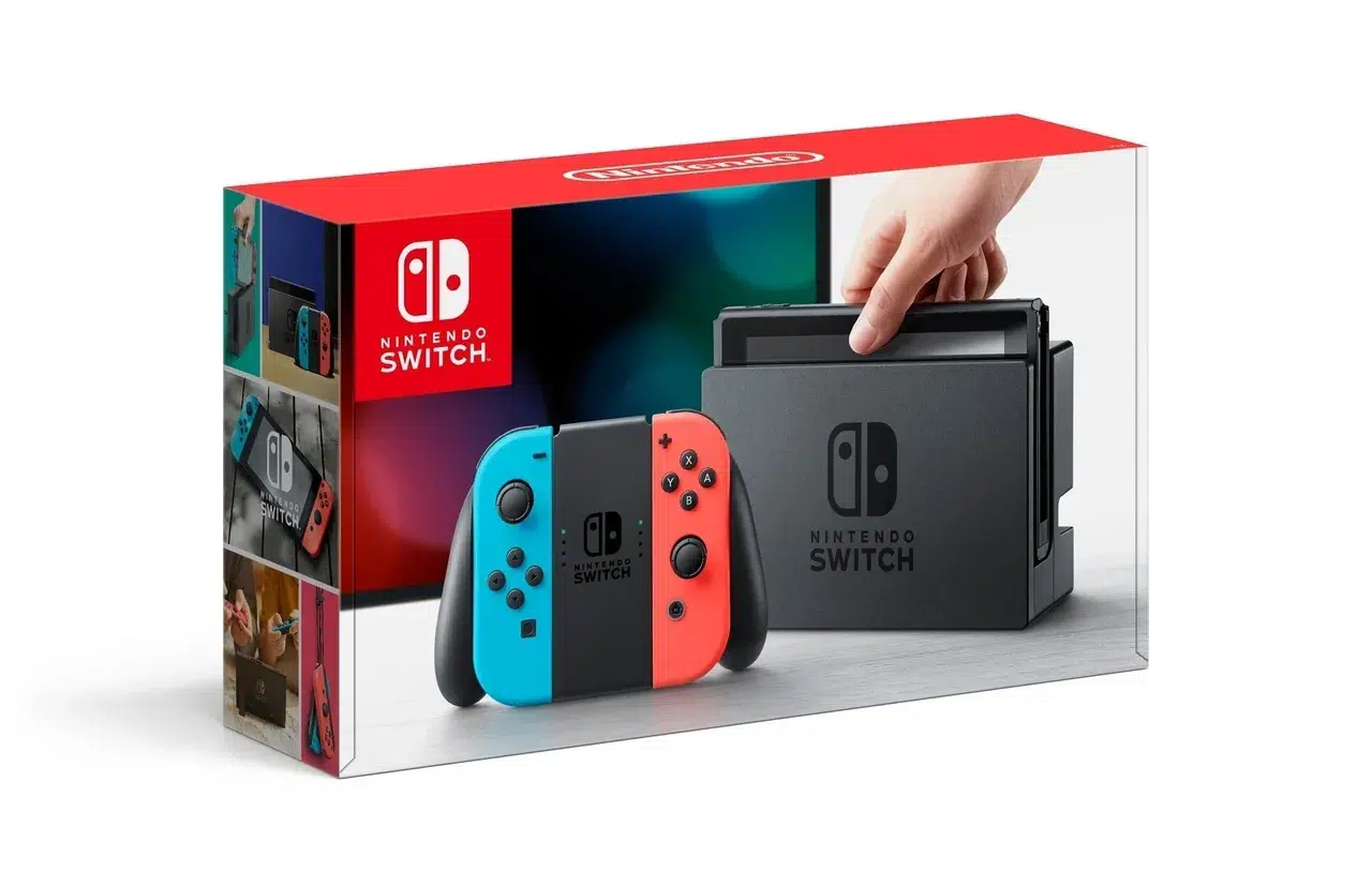 Nintendo Switch boxed bundle featuring a blue and red Joy Con pair in front of the docking station