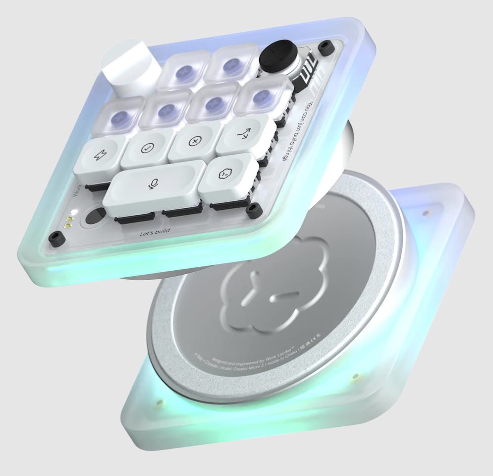 Exploded view of a compact modular keyboard inside a translucent case with white keycaps and RGB edge lighting