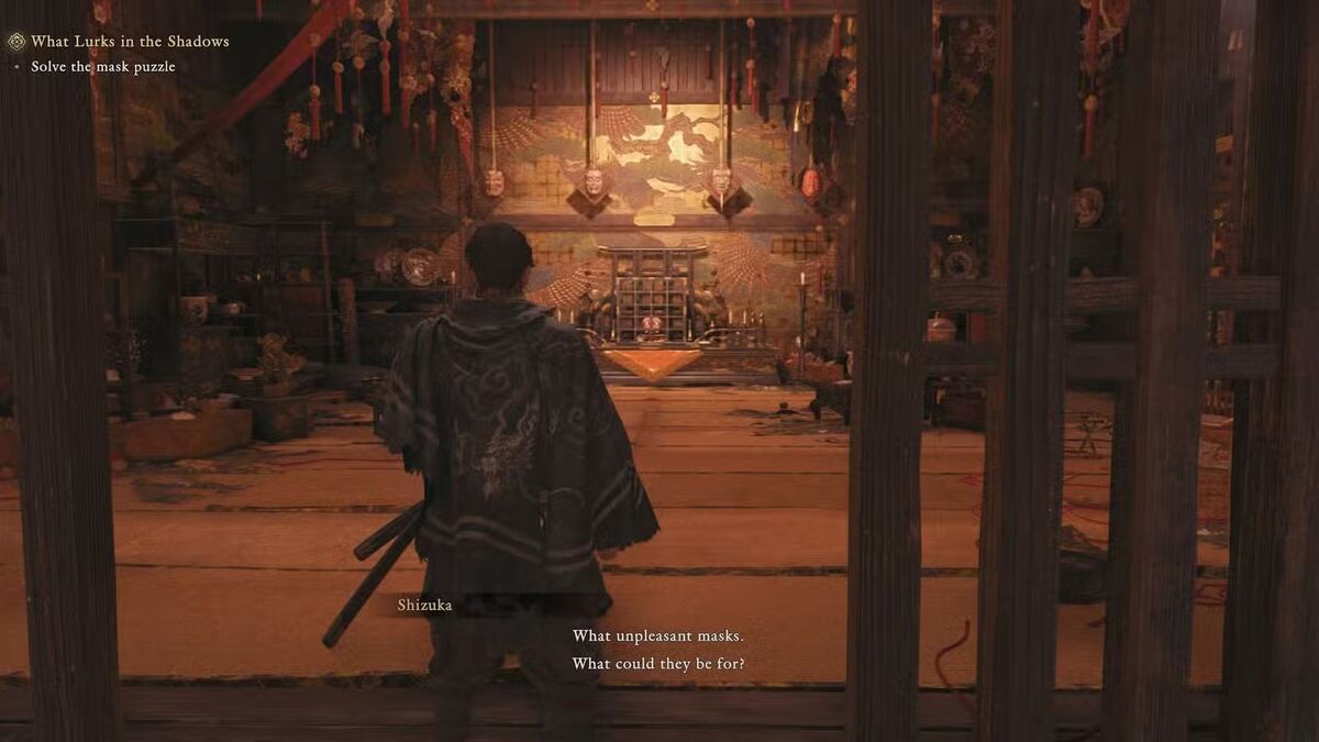 Скриншот Onimusha Way of the Sword на котором Мусаси находится в комнате с головоломкой с масками